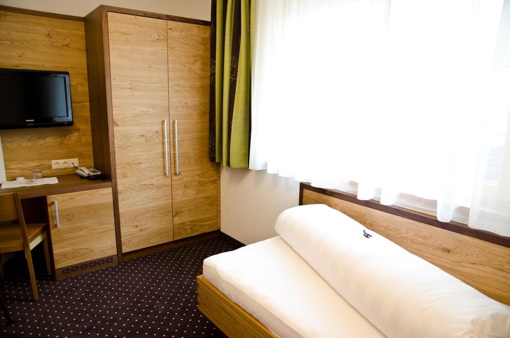 Hotel Garni Arosa 4*